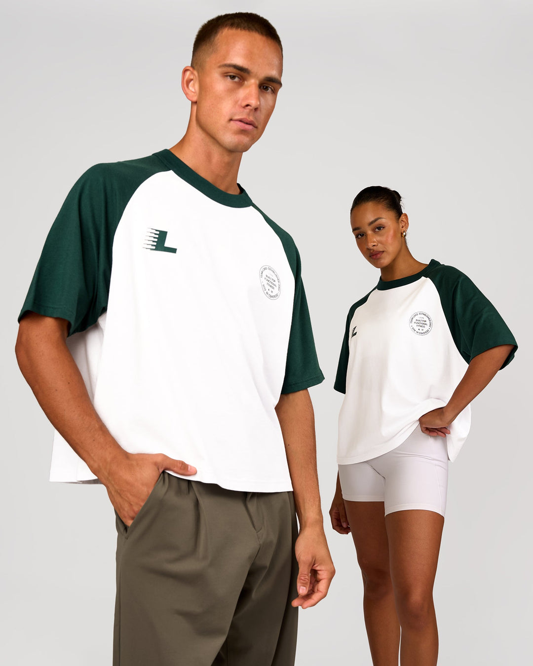 Duo wearing Victory Heavyweight Boxed Raglan Tee - White-Midnight Green | Model:Rosie | Size:XS | Model:Albert | Size:M - view 4