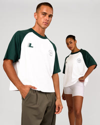 Duo wearing Victory Heavyweight Boxed Raglan Tee - White-Midnight Green | Model:Rosie | Size:XS | Model:Albert | Size:M | Thumbnail Index: 3