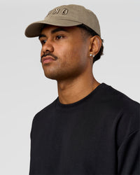 Man wearing Daily Cap - Taupe Ash | Model:Cap | Size:DAILY | Thumbnail Index: 0