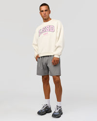 Man wearing Varsity Boxy Crew - Off White-Pink Rose | Model:Albert | Size:L