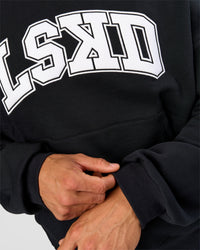 Man wearing Varsity Boxy Hoodie - Caviar-White | Model:Albert | Size:L