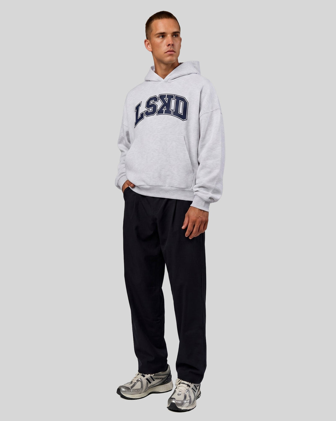 Man wearing Varsity Boxy Hoodie - Silver Marl-Future Navy | Model:Albert | Size:L
