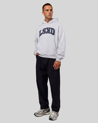 Man wearing Varsity Boxy Hoodie - Silver Marl-Future Navy | Model:Albert | Size:L
