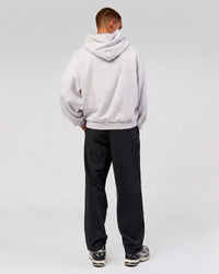 Man wearing Varsity Boxy Hoodie - Silver Marl-Future Navy | Model:Albert | Size:L