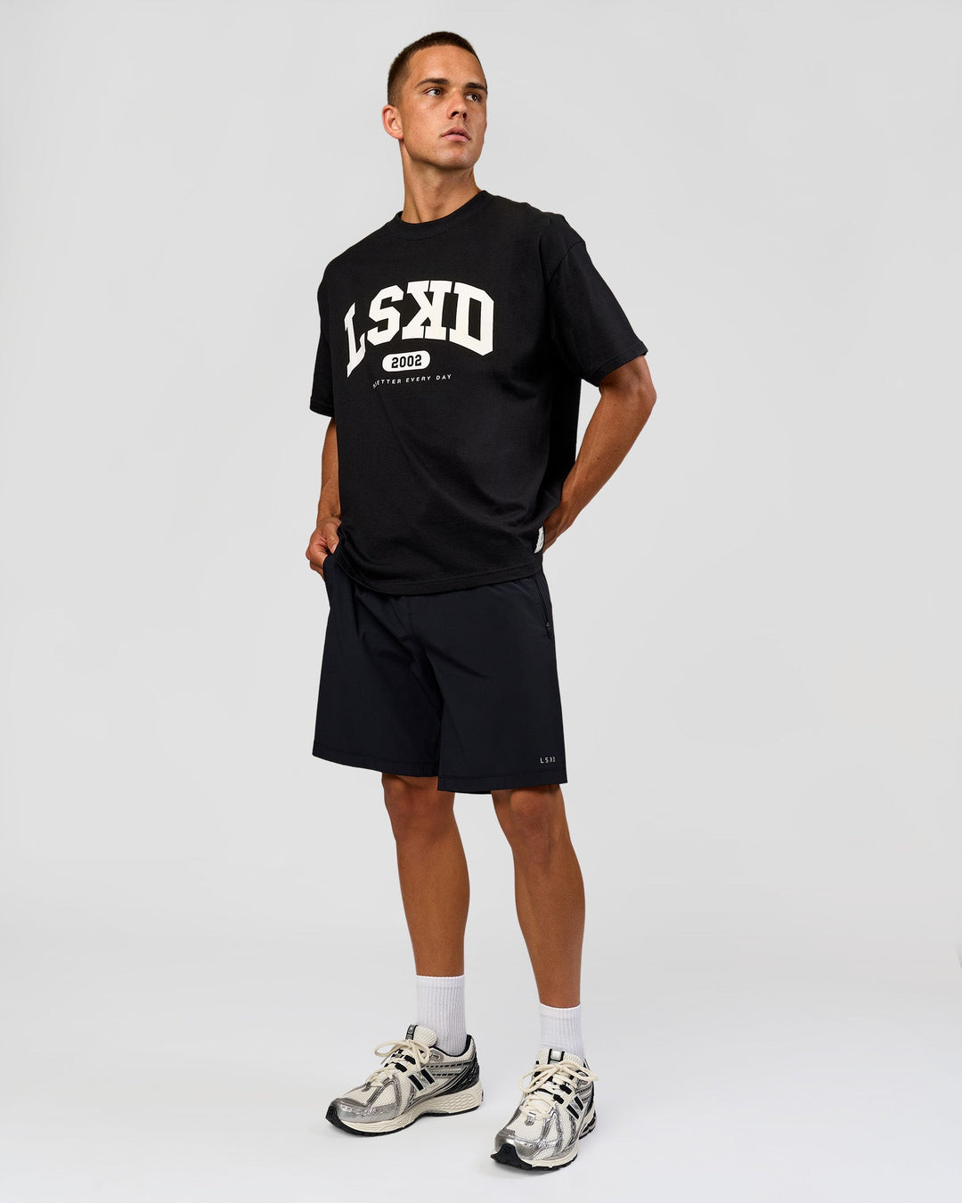 Man wearing Varsity EST Heavyweight Oversized Tee  - Black-Off White | Model:Albert | Size:L - view 3