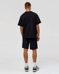 Man wearing Varsity EST Heavyweight Oversized Tee  - Black-Off White | Model:Albert | Size:L | Thumbnail Index: 6