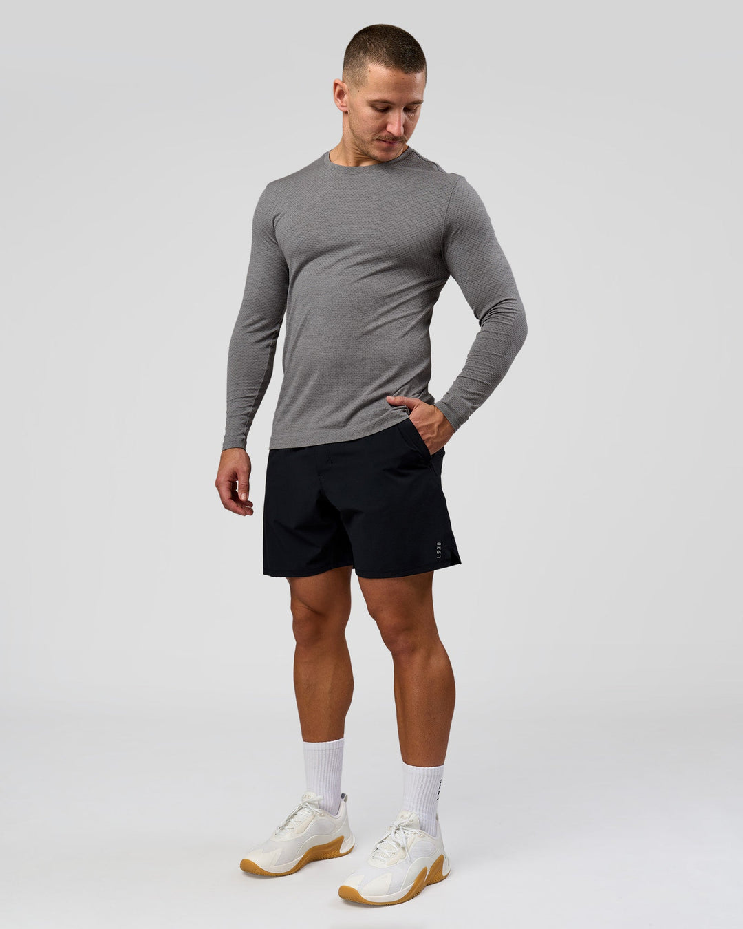 Man wearing AeroFLX+ Seamless Long Sleeve Tee (Set in Sleeve) - Dark Storm/Alloy | Model:Jaiden | Size:L - view 3
