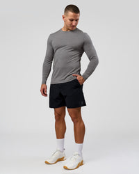 Man wearing AeroFLX+ Seamless Long Sleeve Tee (Set in Sleeve) - Dark Storm/Alloy | Model:Jaiden | Size:L | Thumbnail Index: 2