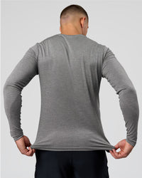 Man wearing AeroFLX+ Seamless Long Sleeve Tee (Set in Sleeve) - Dark Storm/Alloy | Model:Jaiden | Size:L | Thumbnail Index: 7