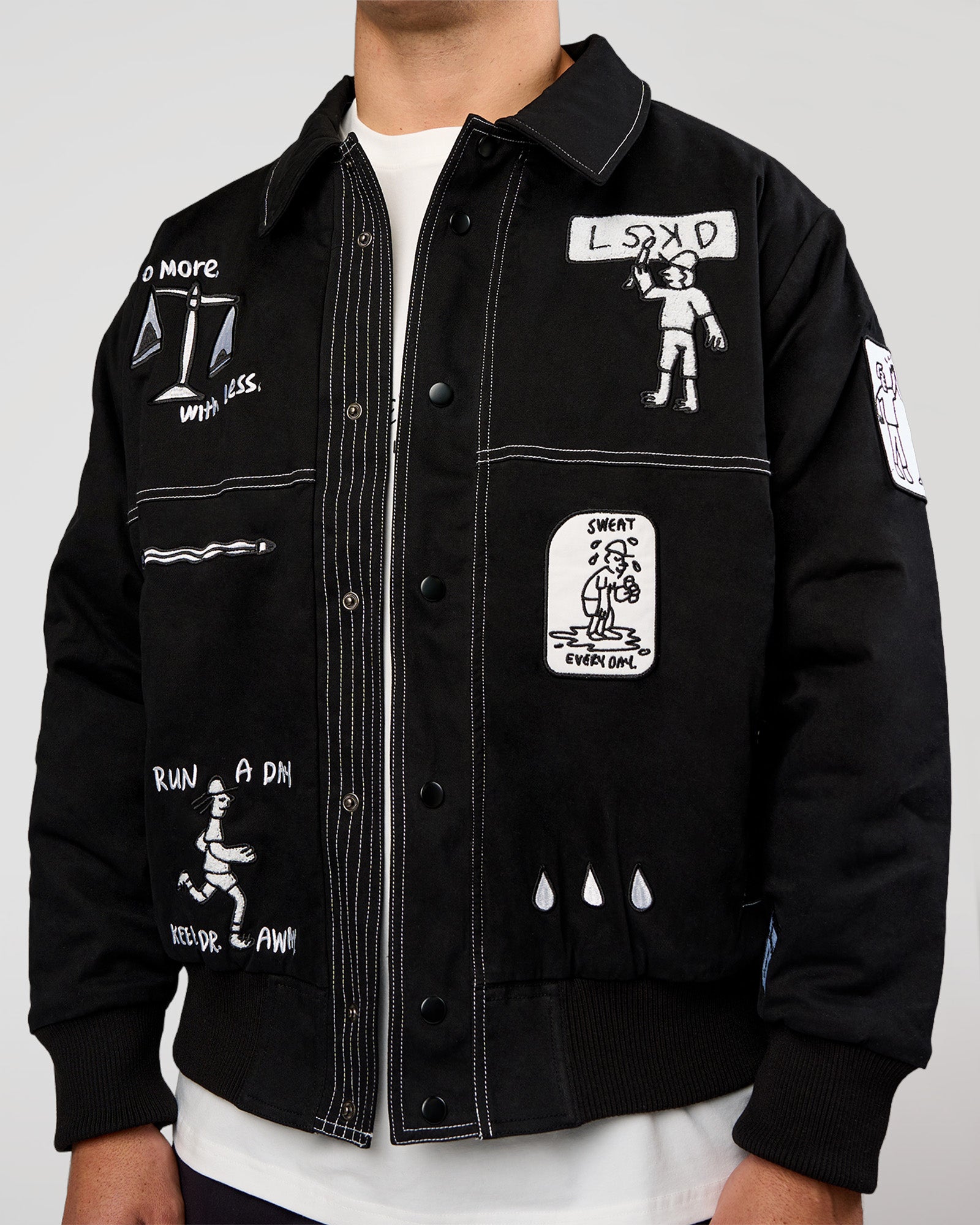 Man wearing Andrew J. Steel x LSKD Bomber Jacket - Black | Model:Jaiden | Size:L