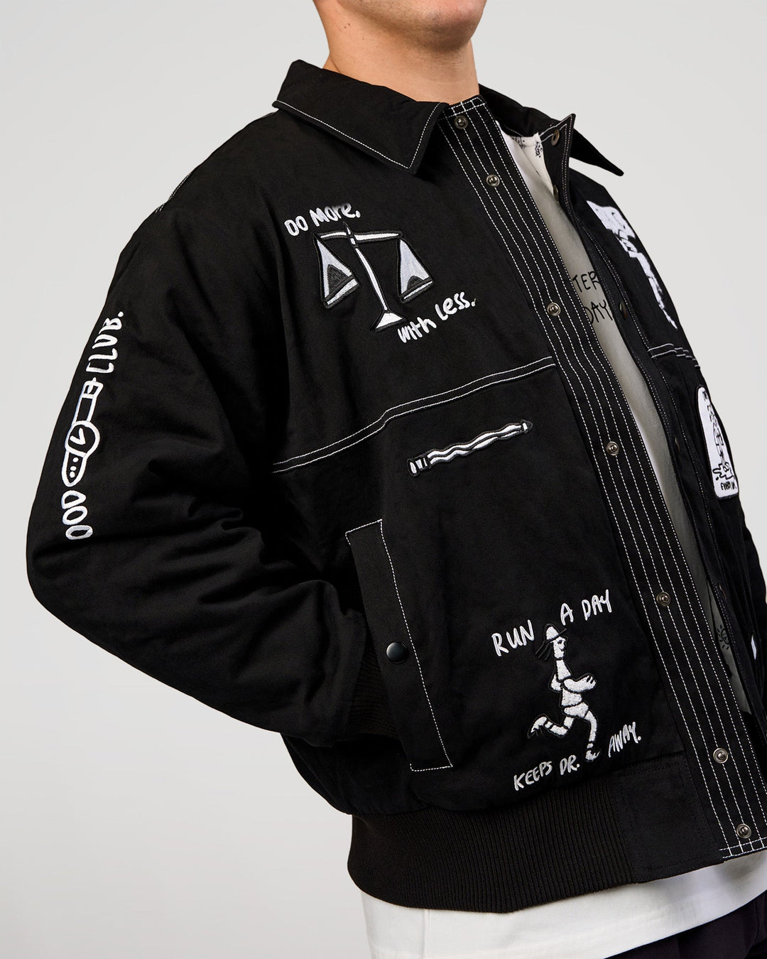 Man wearing Andrew J. Steel x LSKD Bomber Jacket - Black | Model:Jaiden | Size:L - view 7