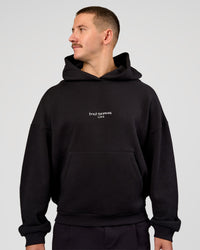 Man wearing Andrew J. Steel x LSKD Boxy Hoodie - Black | Model:Jaiden | Size:L | Thumbnail Index: 6