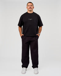 Man wearing Andrew J. Steel x LSKD Heavyweight Boxed Tee - Black | Model:Jaiden | Size:L | Thumbnail Index: 7