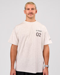 Man wearing Hybrid Elements Heavyweight FLXCotton Oversized Tee  - Silver Marl | Model:Jaiden | Size:L | Thumbnail Index: 2