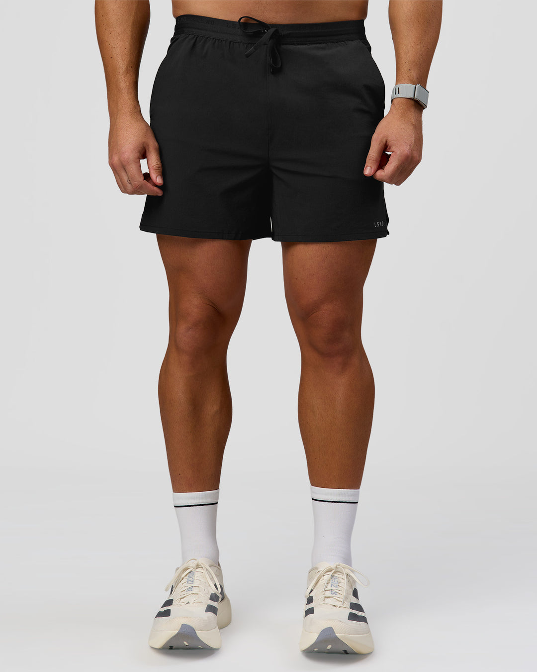 Man wearing Pace 5" Lined Ripstop Short - Black | Model:Jaiden | Size:L - view 1