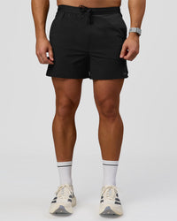 Man wearing Pace 5" Lined Ripstop Short - Black | Model:Jaiden | Size:L | Thumbnail Index: 0
