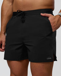 Man wearing Pace 5" Lined Ripstop Short - Black | Model:Jaiden | Size:L | Thumbnail Index: 6