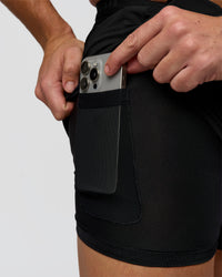 Man wearing Pace 5" Lined Ripstop Short - Black | Model:Jaiden | Size:L | Thumbnail Index: 2