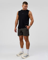 Man wearing Pace 5" Lined Running Short - Black-Onyx | Model:Jaiden | Size:L
