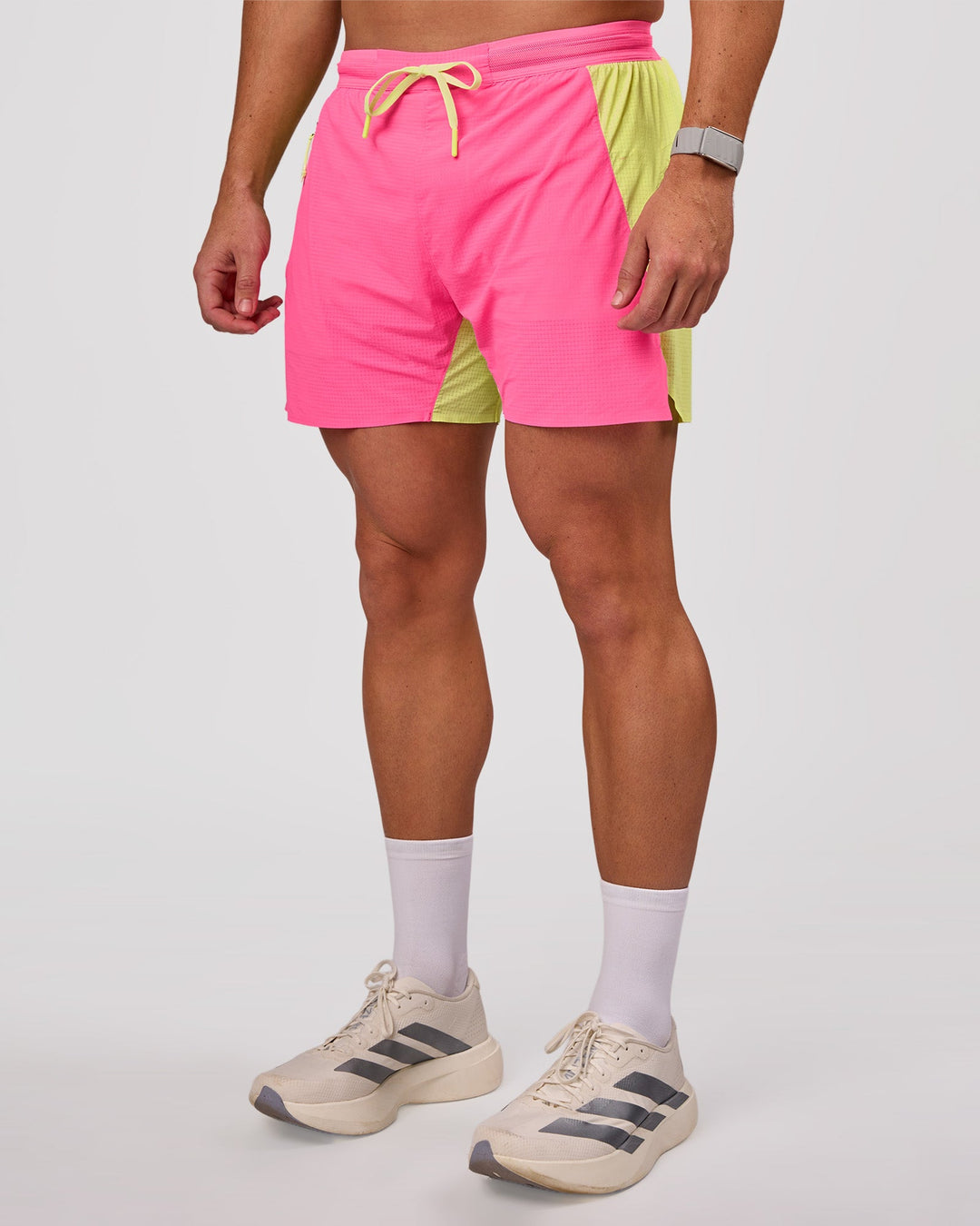 Man wearing UltraAir 5" Lined Performance Short - Sugar Plum-Lime Glo | Model:Jaiden | Size:L - view 2