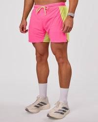 Man wearing UltraAir 5" Lined Performance Short - Sugar Plum-Lime Glo | Model:Jaiden | Size:L | Thumbnail Index: 1