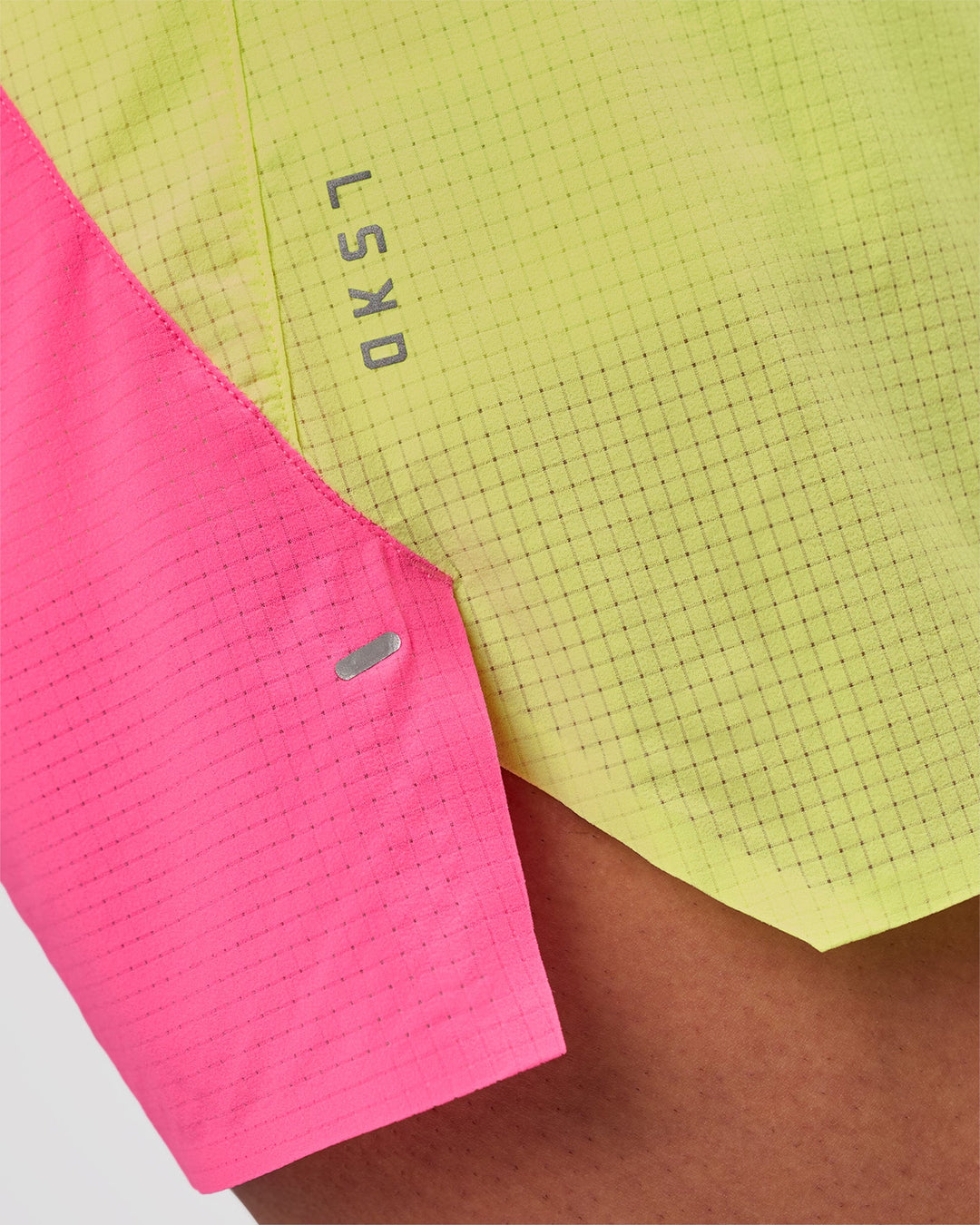 Man wearing UltraAir 5" Lined Performance Short - Sugar Plum-Lime Glo | Model:Jaiden | Size:L - view 11
