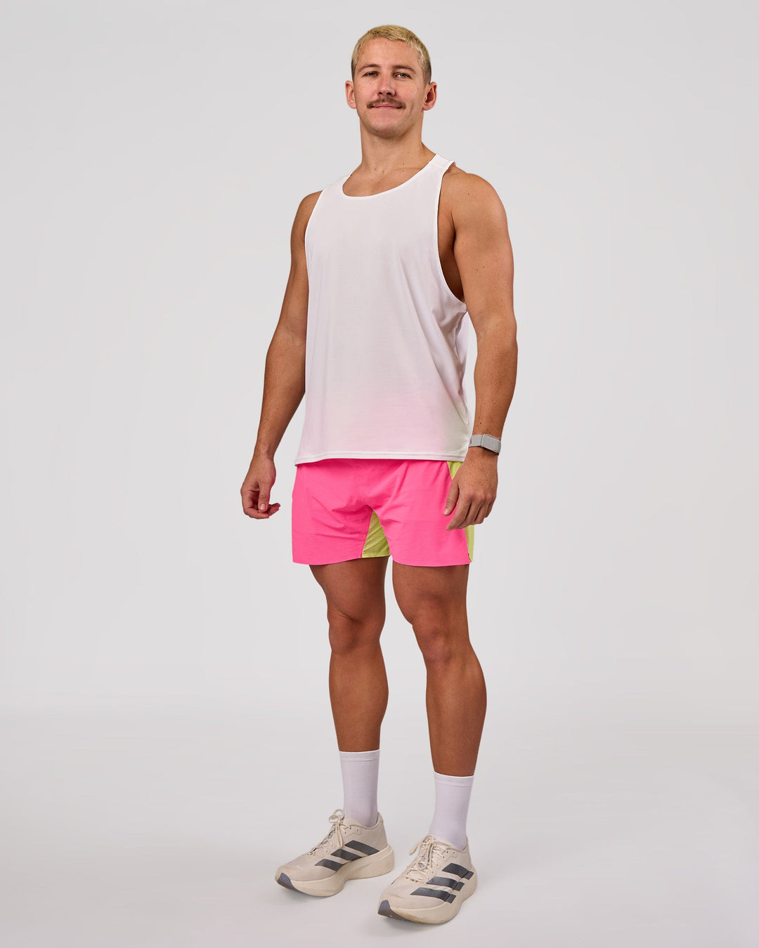 Man wearing UltraAir 5" Lined Performance Short - Sugar Plum-Lime Glo | Model:Jaiden | Size:L - view 5