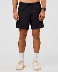Man wearing Rep 7'' Training Short  - Black | Model:Liam | Size:L