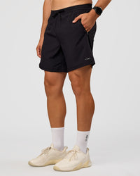 Man wearing Rep 7'' Training Short  - Black | Model:Liam | Size:L
