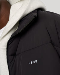 Man wearing Base Puffer Jacket - Black | Model:Okello | Size:L | Thumbnail Index: 14
