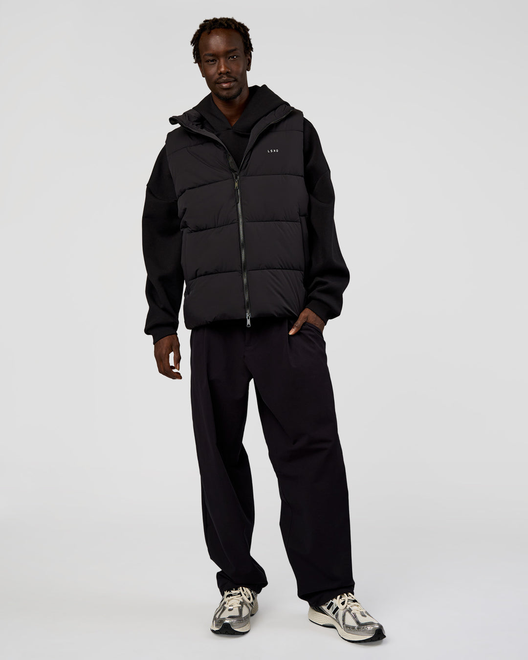 Man wearing Base Puffer Vest - Black | Model:Okello | Size:L - view 3
