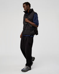 Man wearing Base Puffer Vest - Black | Model:Okello | Size:L | Thumbnail Index: 6