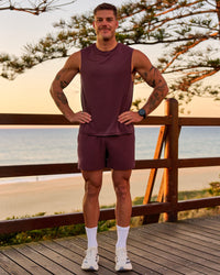Man wearing Rep Muscle Training Tank - Cherry Lacquer | Model:Riley | Size:L | Thumbnail Index: 5
