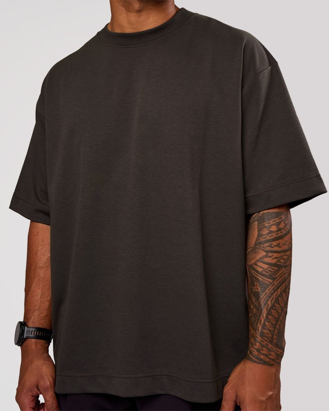 Man wearing AfterDark ZeroCrease Oversized Tee - Onyx | Model:Xav | Size:L - view 2
