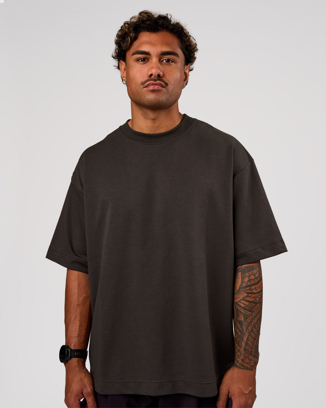 Man wearing AfterDark ZeroCrease Oversized Tee - Onyx | Model:Xav | Size:L - view 3