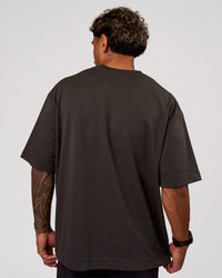 Man wearing AfterDark ZeroCrease Oversized Tee - Onyx | Model:Xav | Size:L | Thumbnail Index: 3