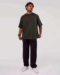 Man wearing AfterDark ZeroCrease Oversized Tee - Onyx | Model:Xav | Size:L | Thumbnail Index: 5