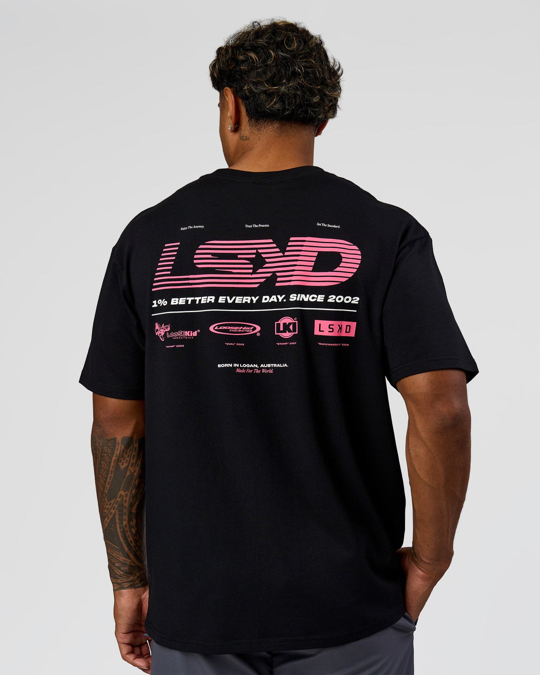 Man wearing Archive FLXCotton Oversized Tee - Black-Candy Pink | Model:Xav | Size:L - view 2