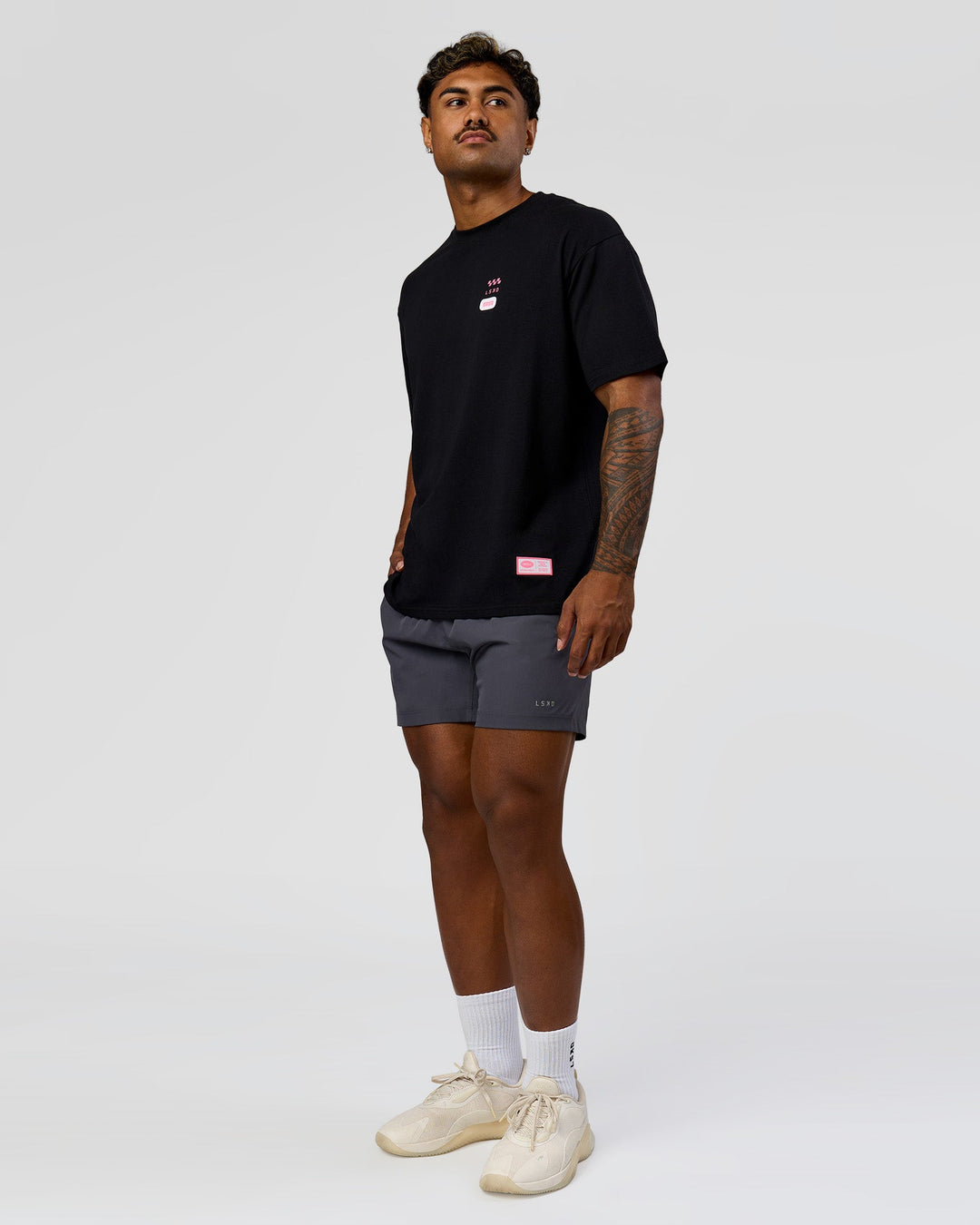 Man wearing Archive FLXCotton Oversized Tee - Black-Candy Pink | Model:Xav | Size:L - view 15