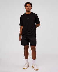 Man wearing Base FLXCotton Tee Oversized - Black | Model:Xav | Size:L | Thumbnail Index: 3