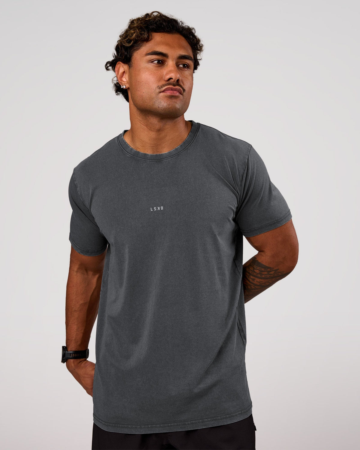 Man wearing Base FLXCotton Tee Oversized - Dark Storm Washed | Model:Xav | Size:L