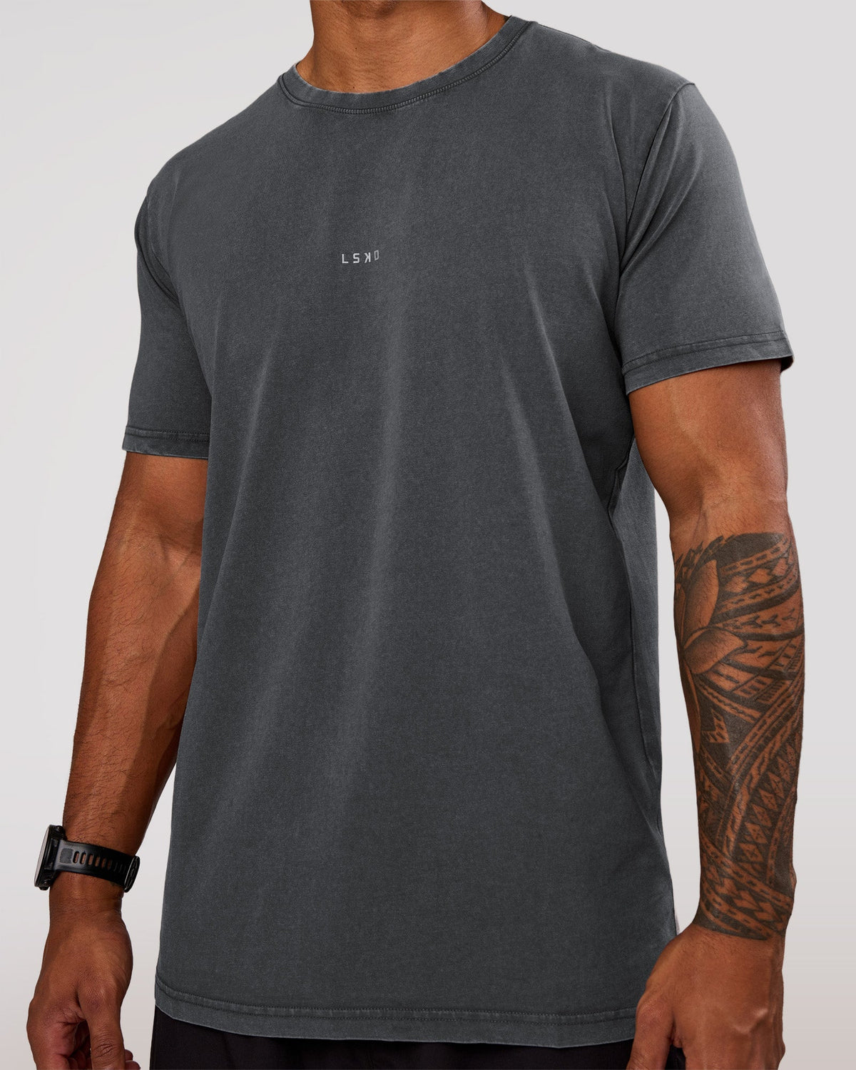 Man wearing Base FLXCotton Tee Oversized - Dark Storm Washed | Model:Xav | Size:L