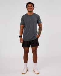 Man wearing Base FLXCotton Tee Oversized - Dark Storm Washed | Model:Xav | Size:L | Thumbnail Index: 3