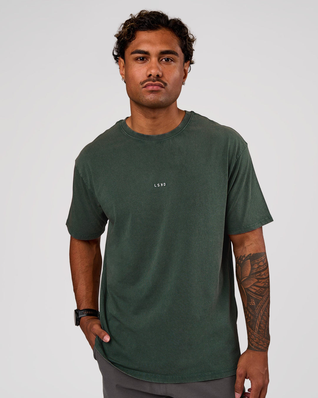 Man wearing Base FLXCotton Tee Oversized - Midnight Green Washed | Model:Xav | Size:L - view 1