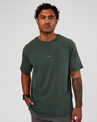 Man wearing Base FLXCotton Tee Oversized - Midnight Green Washed | Model:Xav | Size:L | Thumbnail Index: 0