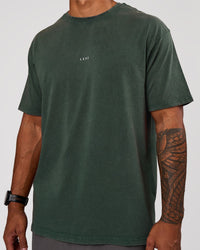 Man wearing Base FLXCotton Tee Oversized - Midnight Green Washed | Model:Xav | Size:L | Thumbnail Index: 1