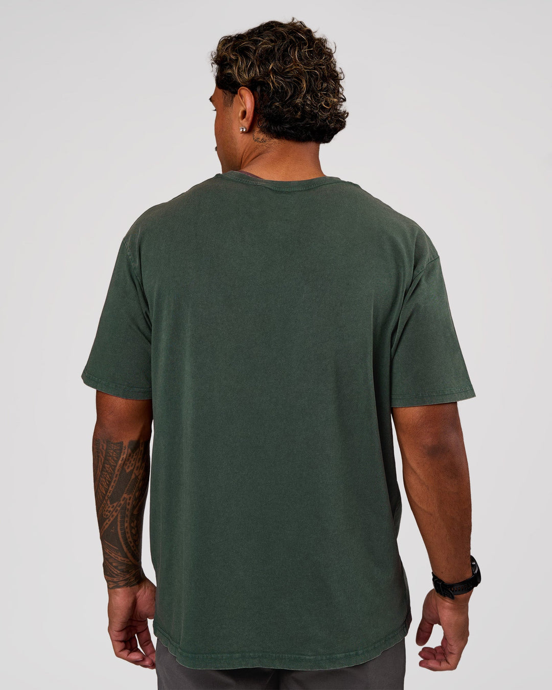 Man wearing Base FLXCotton Tee Oversized - Midnight Green Washed | Model:Xav | Size:L - view 3