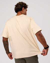 Man wearing Block Heavyweight Oversized Tee  - Vanilla Bean | Model:Xav | Size:L | Thumbnail Index: 4