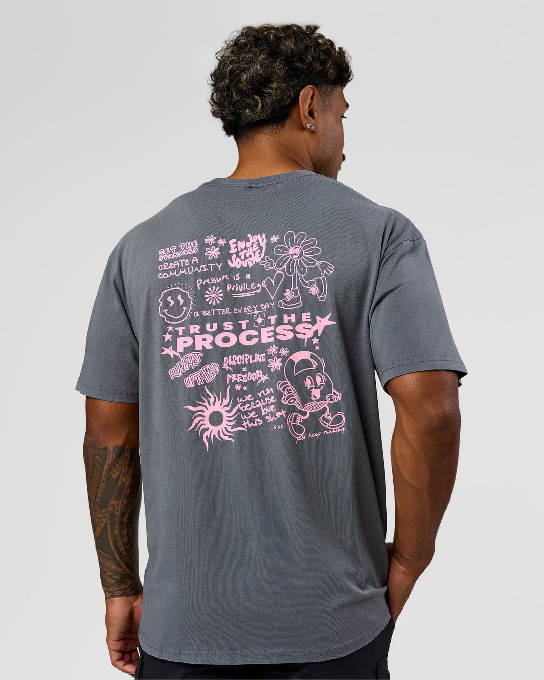 Man wearing Built On Values FLXCotton Oversized Tee - Dark Storm Washed-Pink Rose | Model:Xav | Size:L - view 13