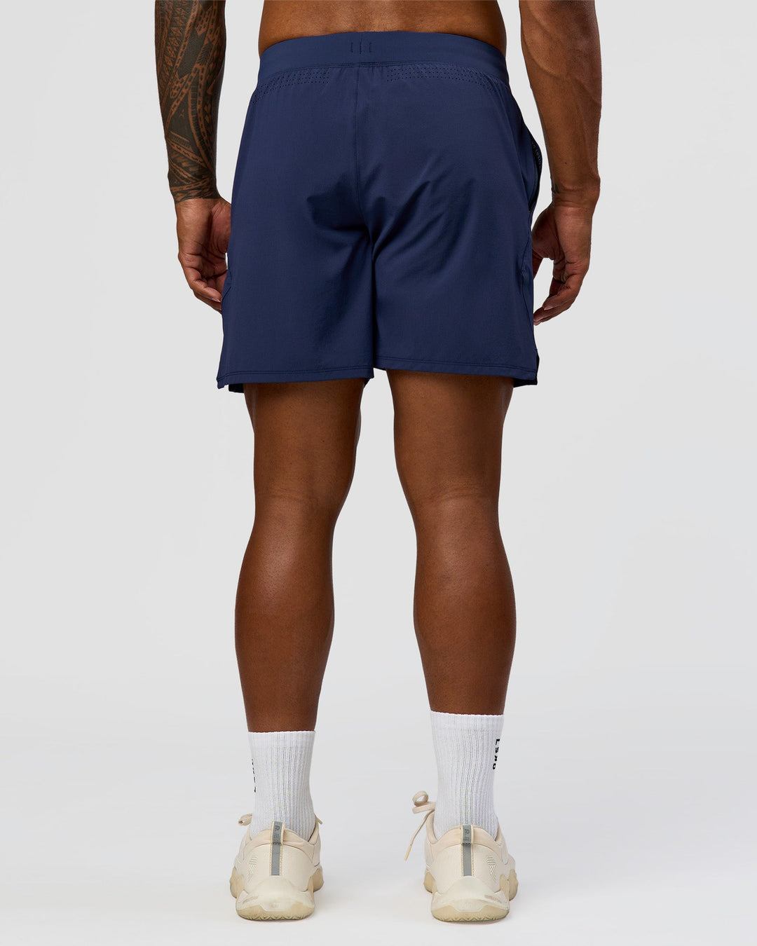 Man wearing Greatest of All Time Functional Training 7" Short - Future Navy-White | Model:Xav | Size:L - view 8